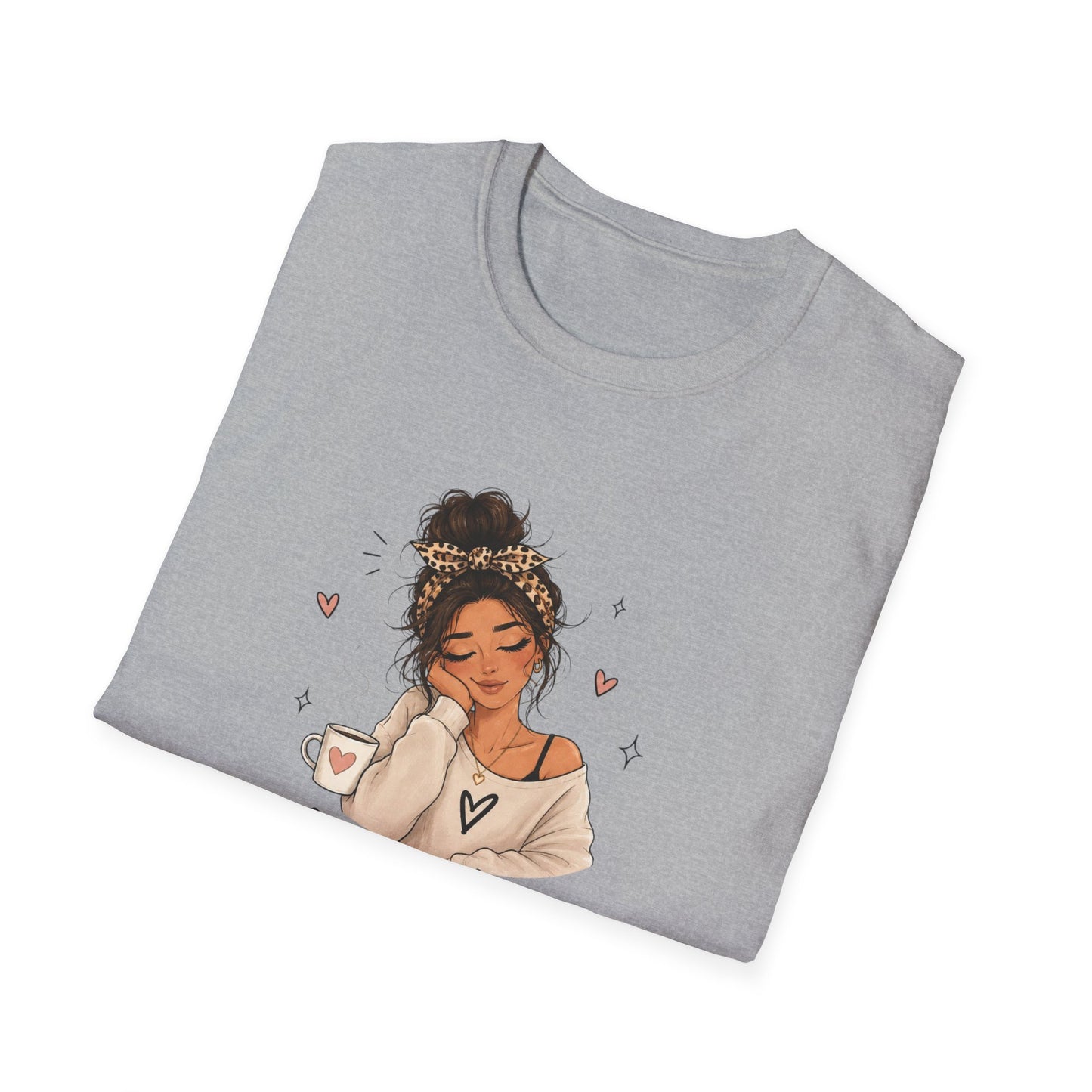 Folded gray t-shirt with an illustration of a woman holding a coffee cup on a white background
