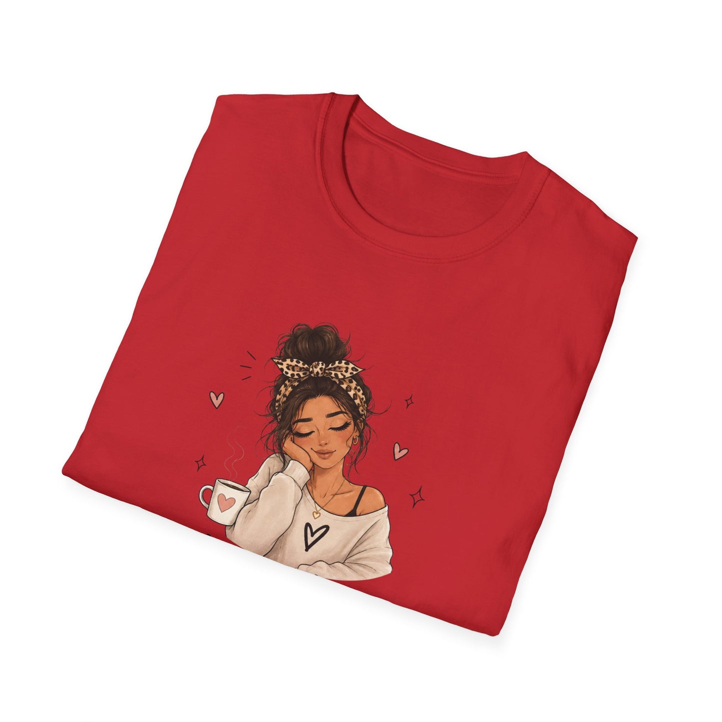 Folded red t-shirt with an illustration of a woman holding a coffee cup on a white background