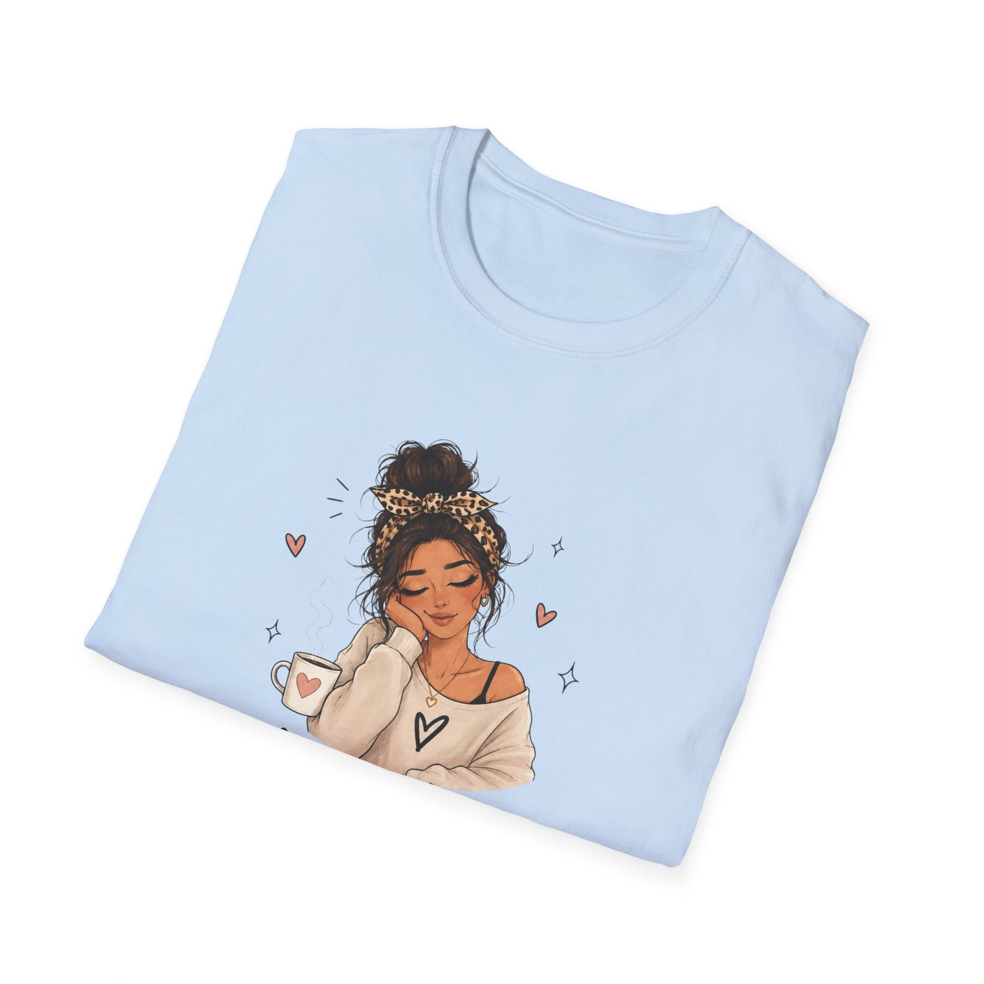 Light blue t-shirt with an illustration of a woman holding a coffee cup on a white background