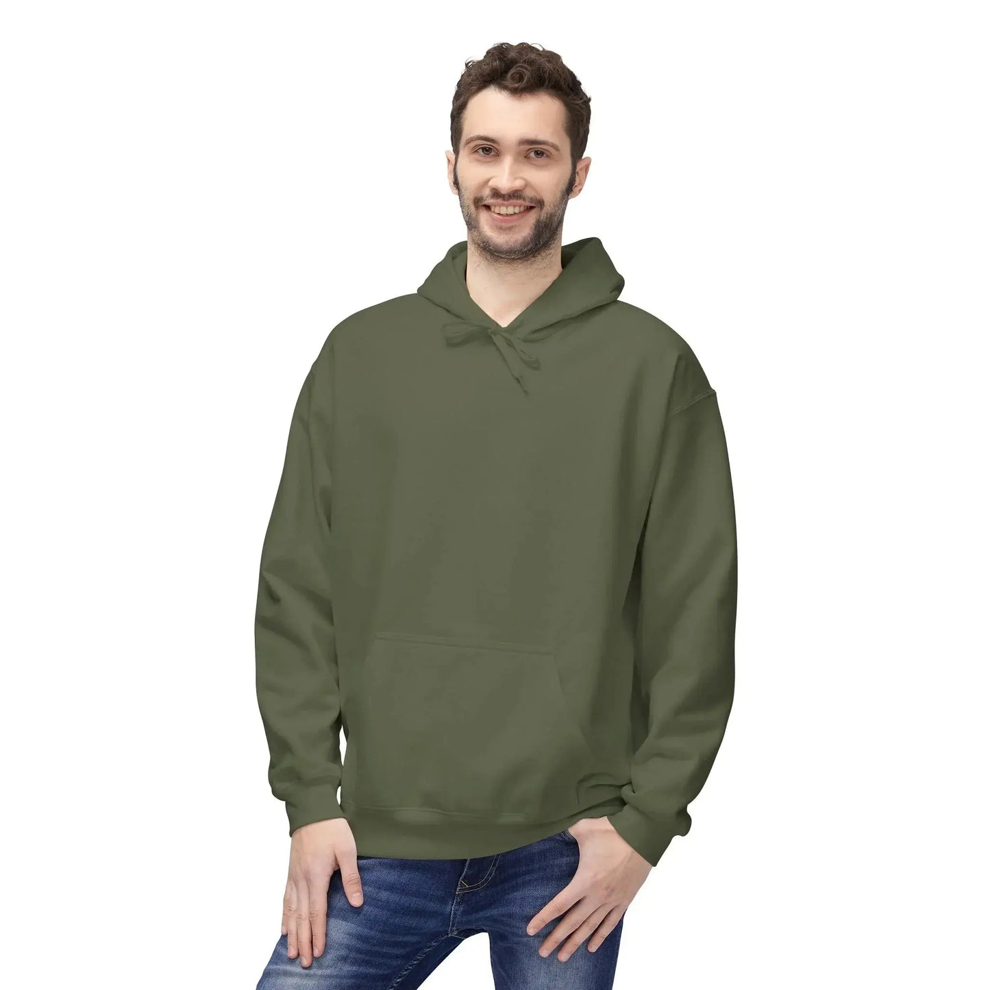 Smiling man wearing an olive green hoodie and blue jeans on a white background
